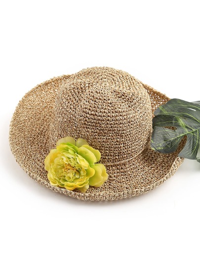 Sombrero playero de paja con adorno de flor