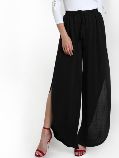 Pantaloni con spacco laterale