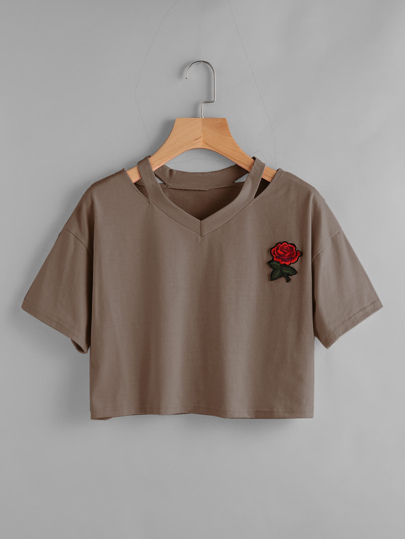 Camiseta con parche y abertura