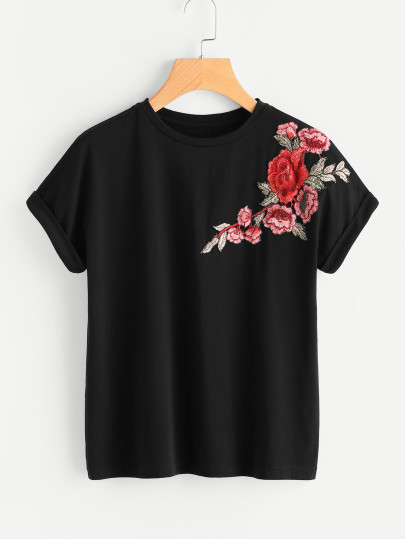 T-shirt con toppa di fiore