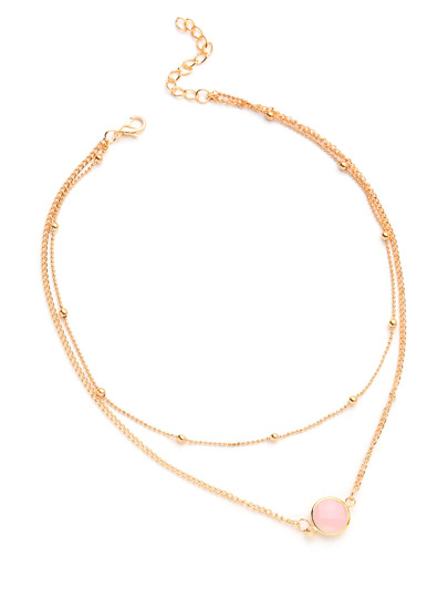 Collar a capas con colgante de cristal en contraste