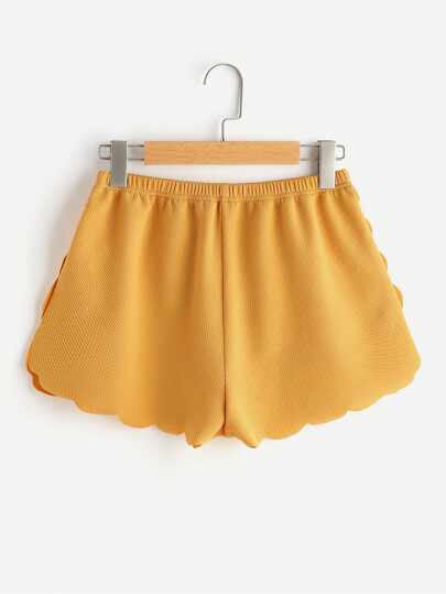 Short con cintura elástica con ribete festoneado