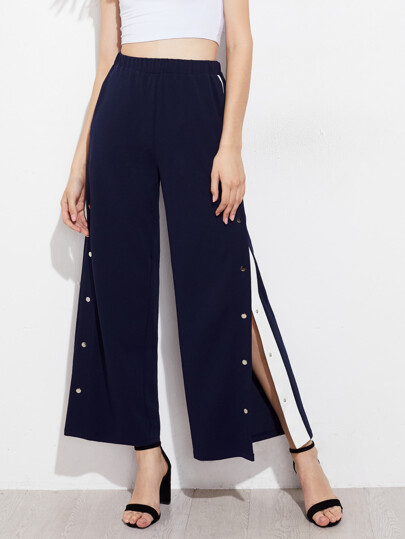Pantalones con panel en contraste y botones de presión