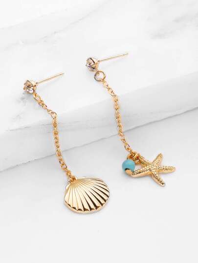 Boucles d\'oreilles design de coquille et étoile de mer