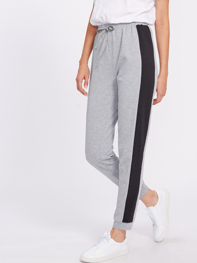 Pantaloni con pannello a contrasto
