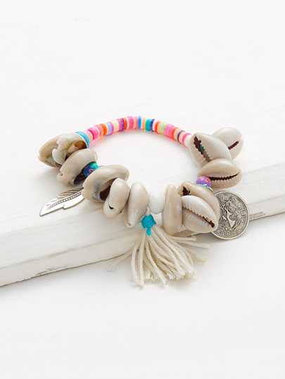 Bracelet décoré de coquille et frange