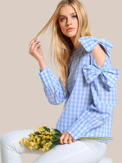 Blusa de guinga con embellecimiento de lazo exagerado con abertura