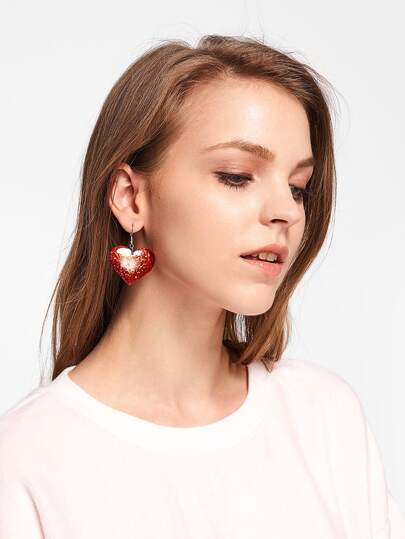 Boucles d\'oreilles design du cœur de paillette