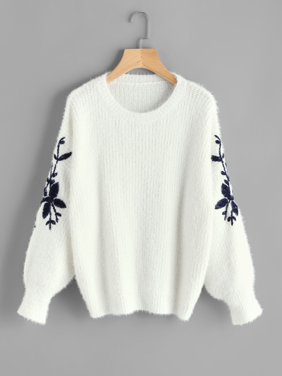 Maglione con ricamo di fiore