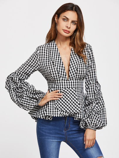 Top de rayas con péplum de cuadros