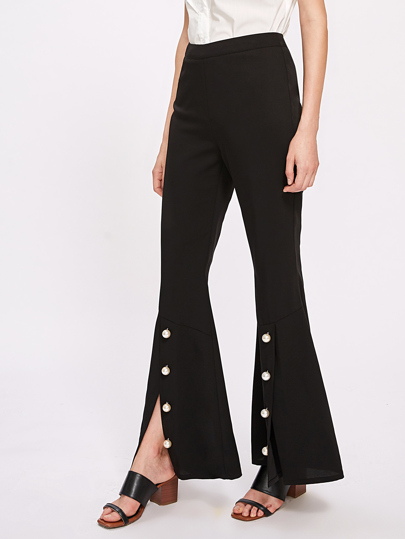Pantalones con detalle de perla con vuelo