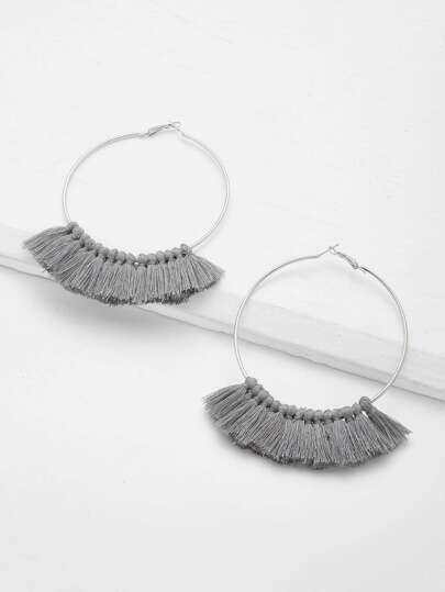 Boucles d\'oreille avec des franges
