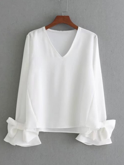 Bluse mit Schleife und Flötehülse