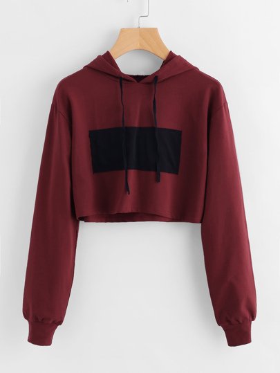 Sweat encapuchonné court avec détail de pièce