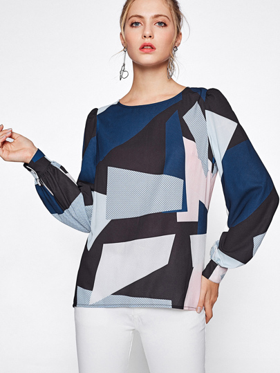 Blouse avec pan asymétrique ave pièce de couleur