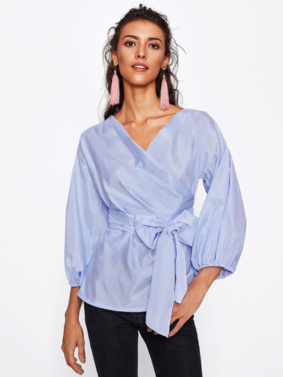 Blouse manche lanterne avec la chute de l\'épaule et la pile inclinée