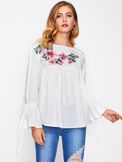 Camicetta con applique ricamato di fiore