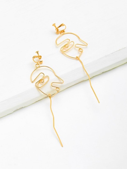Pendientes con diseño de cara metálica hueca