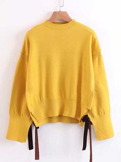 Jersey con hombro caído y detalle de cordón