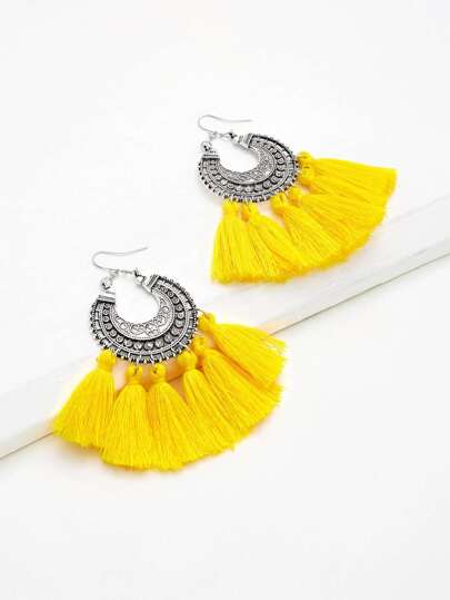 Boucles d\'oreille avec des franges