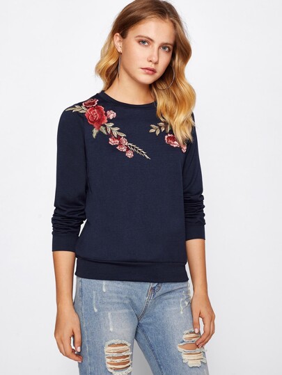 Camisa con parche de bordado