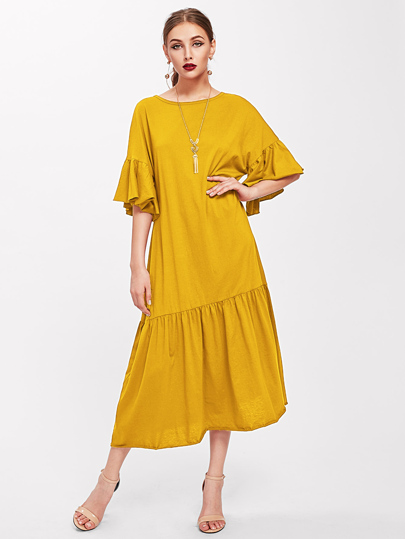 Kleid mit Trompetenhülsen und abgestuftem Saum