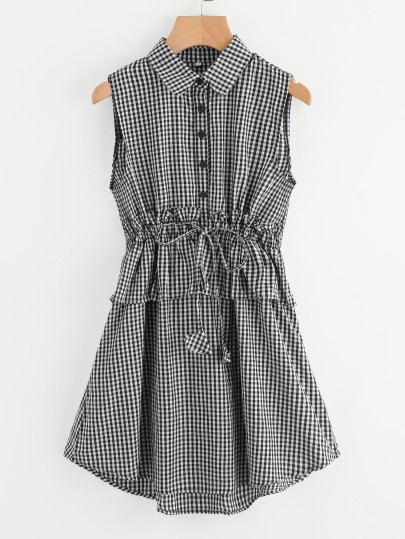 Kleid mit halber Knopfleiste und schößchem Saum