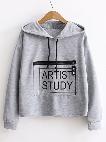 Sweat-shirt à capuche avec le zip et des poches et un lacet