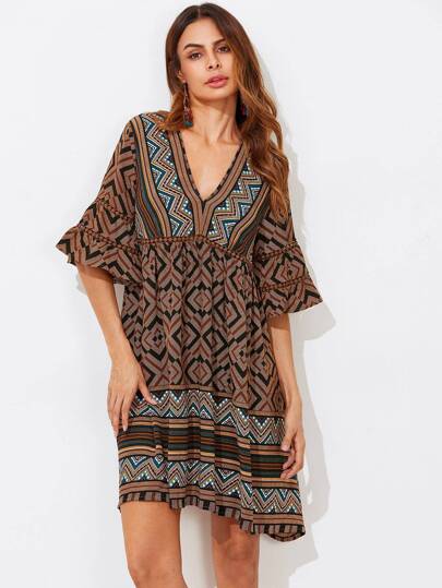 Robe manche trompette imprimée tribal en dentelle
