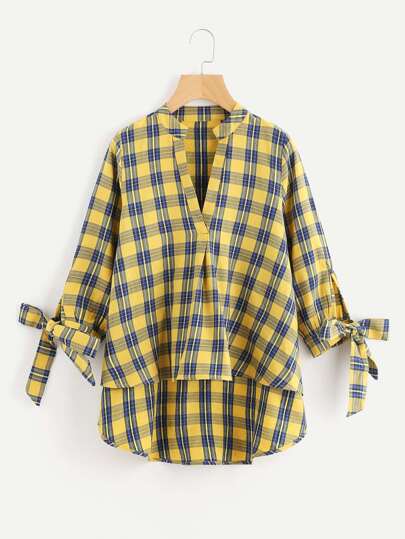 Blusa asimétrica de cuadros con lazos