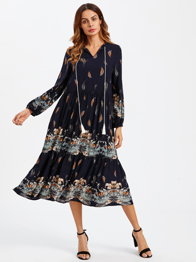 Robe avec manche lanterne avec frange lacet du col