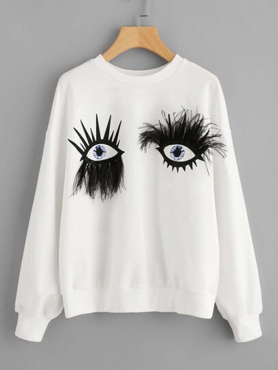 Sudadera con hombro caído con estampado de ojos