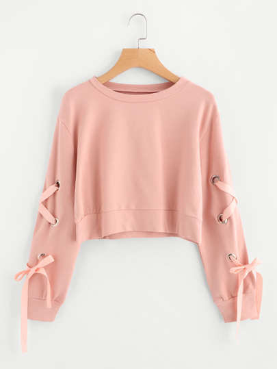 Crop Sweatshirt mit Öse und Schnüren um den Ärmeln