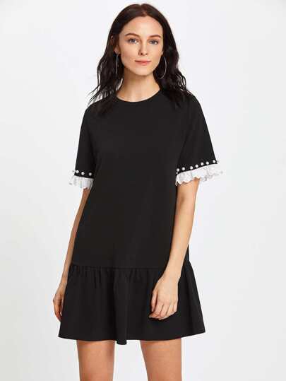 Vestido con perlas y volantes