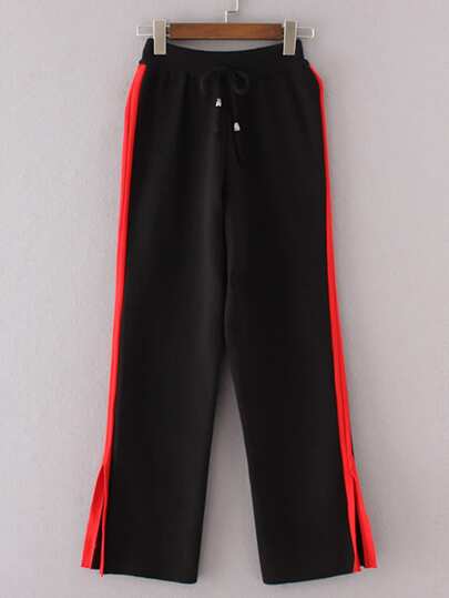 Pantalones a rayas con abertura al lado