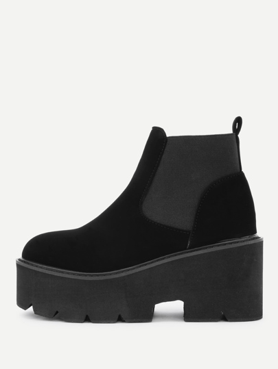 Botines de cuña en puntera redonda