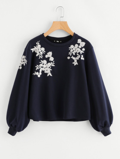 Sudadera de manga exagerada con bordado