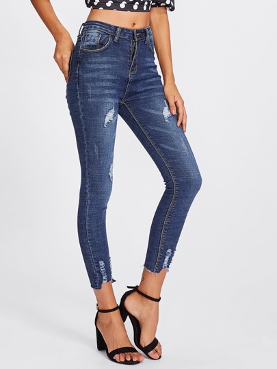 Jeans avec pan déchiré