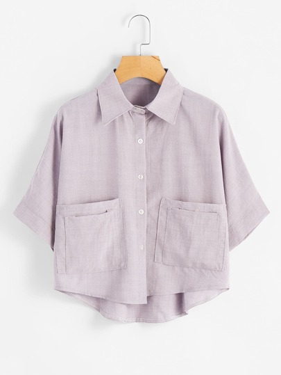 Blusa asimétrica con dos bolsillos