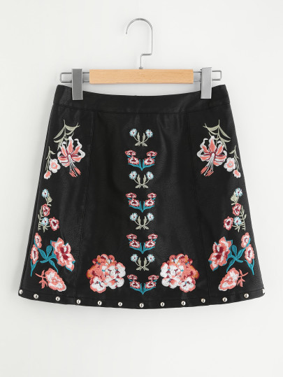 Jupe en cuir faux brodé pan avec rivet