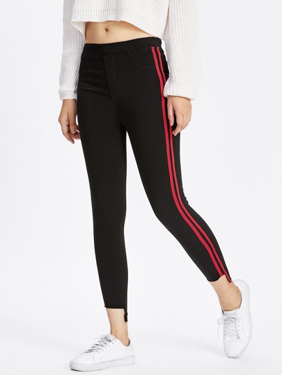 Pantalons avec pan découpé rayure bicolore