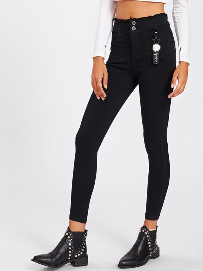 Jeans moulant avec pan déchiré
