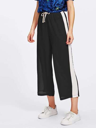 Pantaloni con pannello a strisce laterale