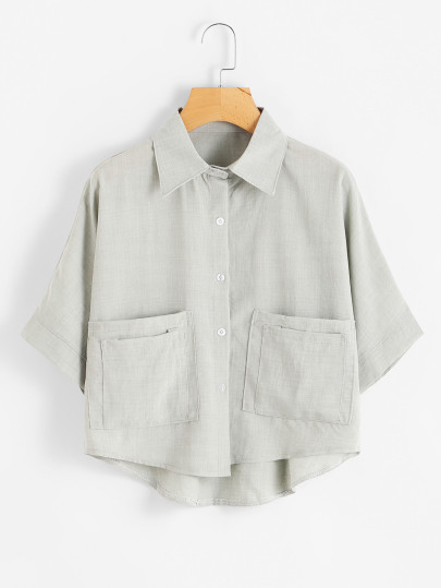 Blusa asimétrica con dos bolsillos