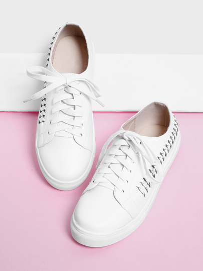 Zapatilla con cordón y detalle de tejido