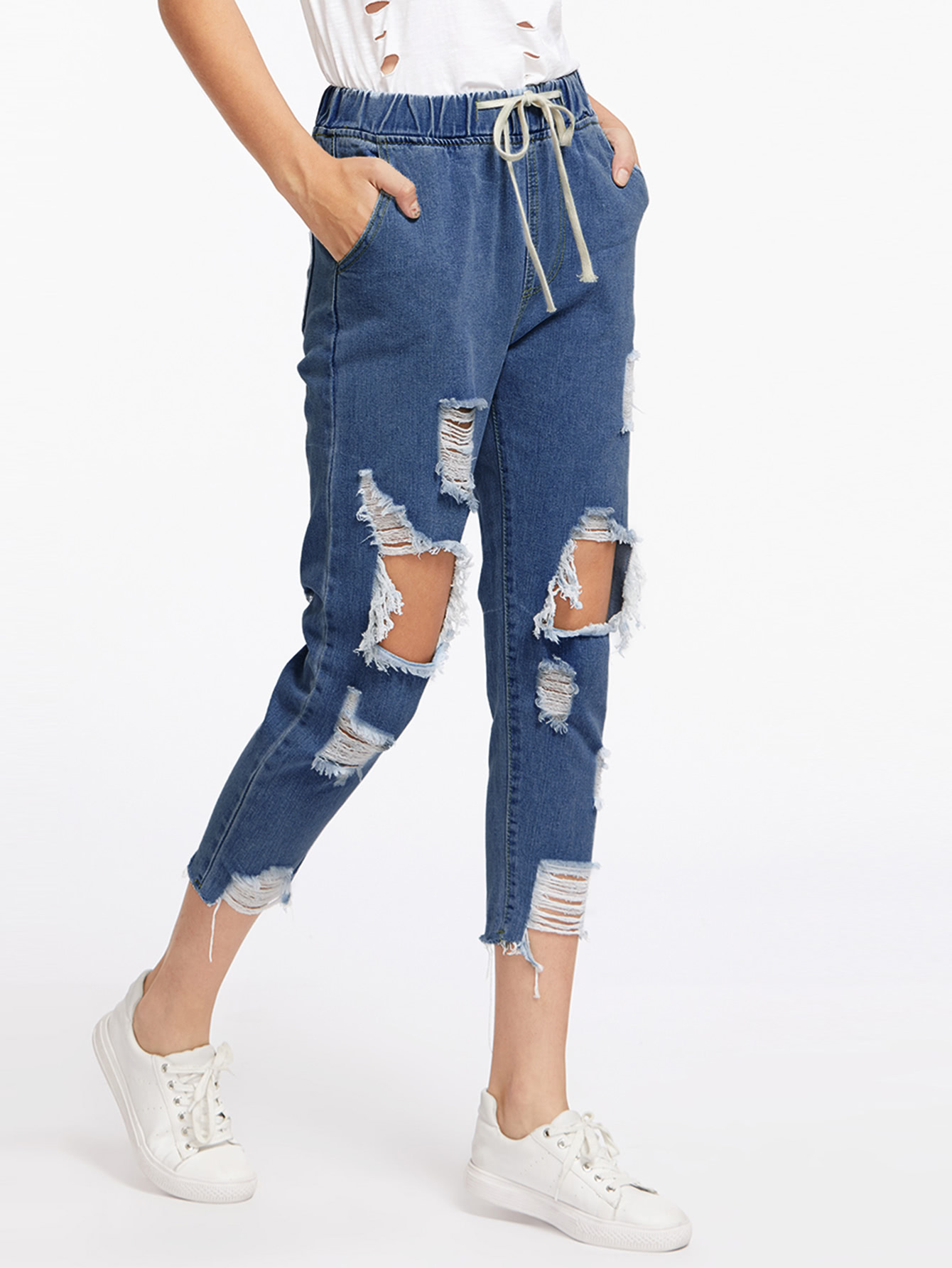 Модные рваные джинсы на кулиске