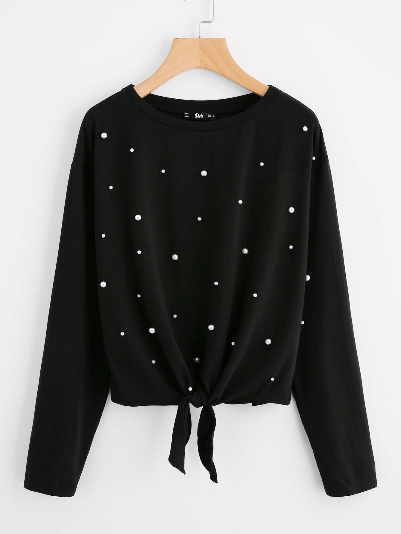 Модный джемпер с бусинами