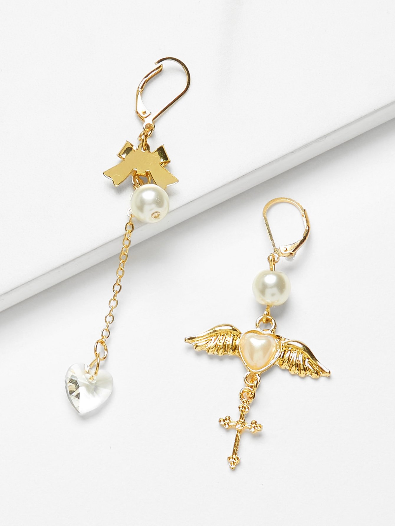 все цены на Wing & Cross Detail Mismatched Drop Earrings онлайн