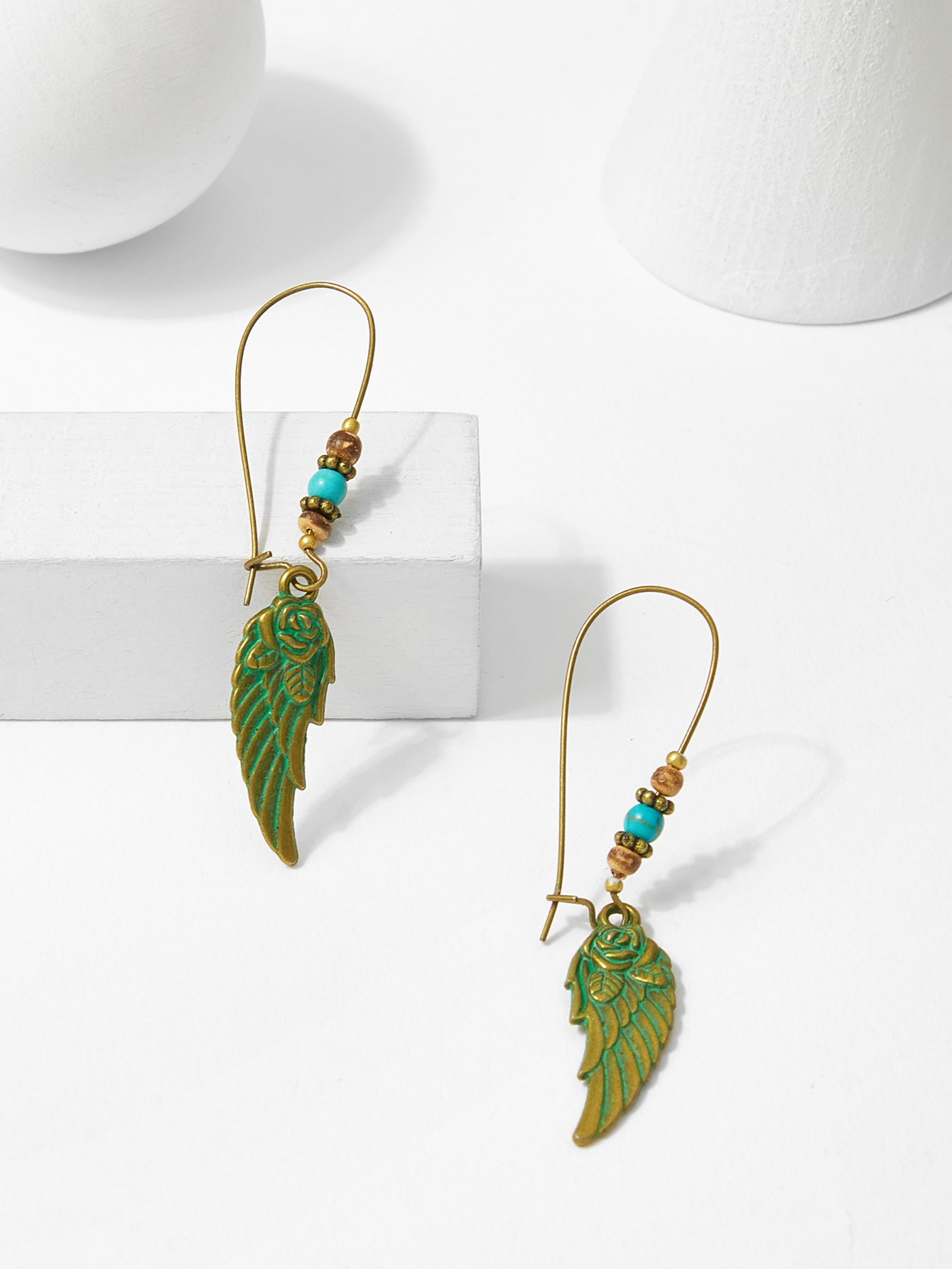 все цены на Wing Shaped Drop Earrings онлайн
