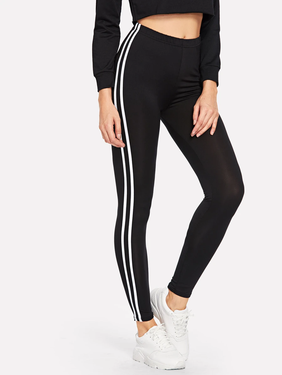 SHEIN MOOSTA Legging met witte zijstrepen en elastische taille